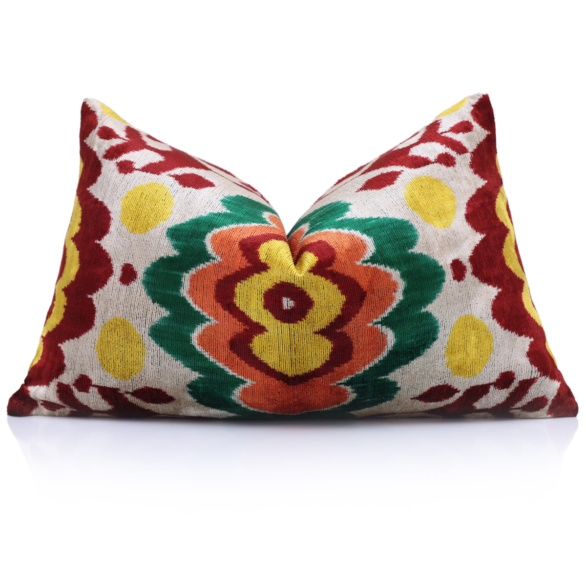 Angled view of ikat lumbar pillow with decorative central medallion