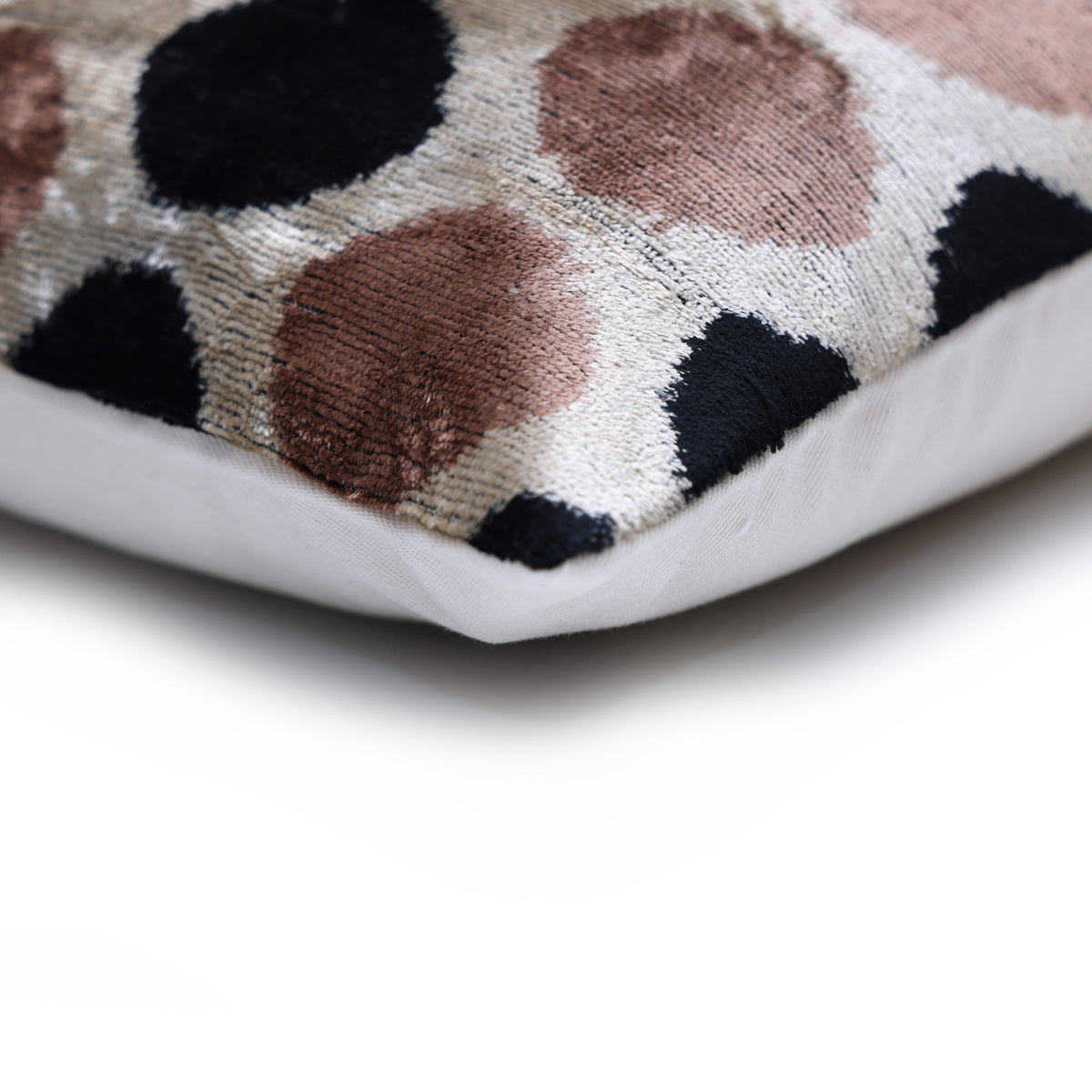 Corner detail showing the velvet face and plain linen backing