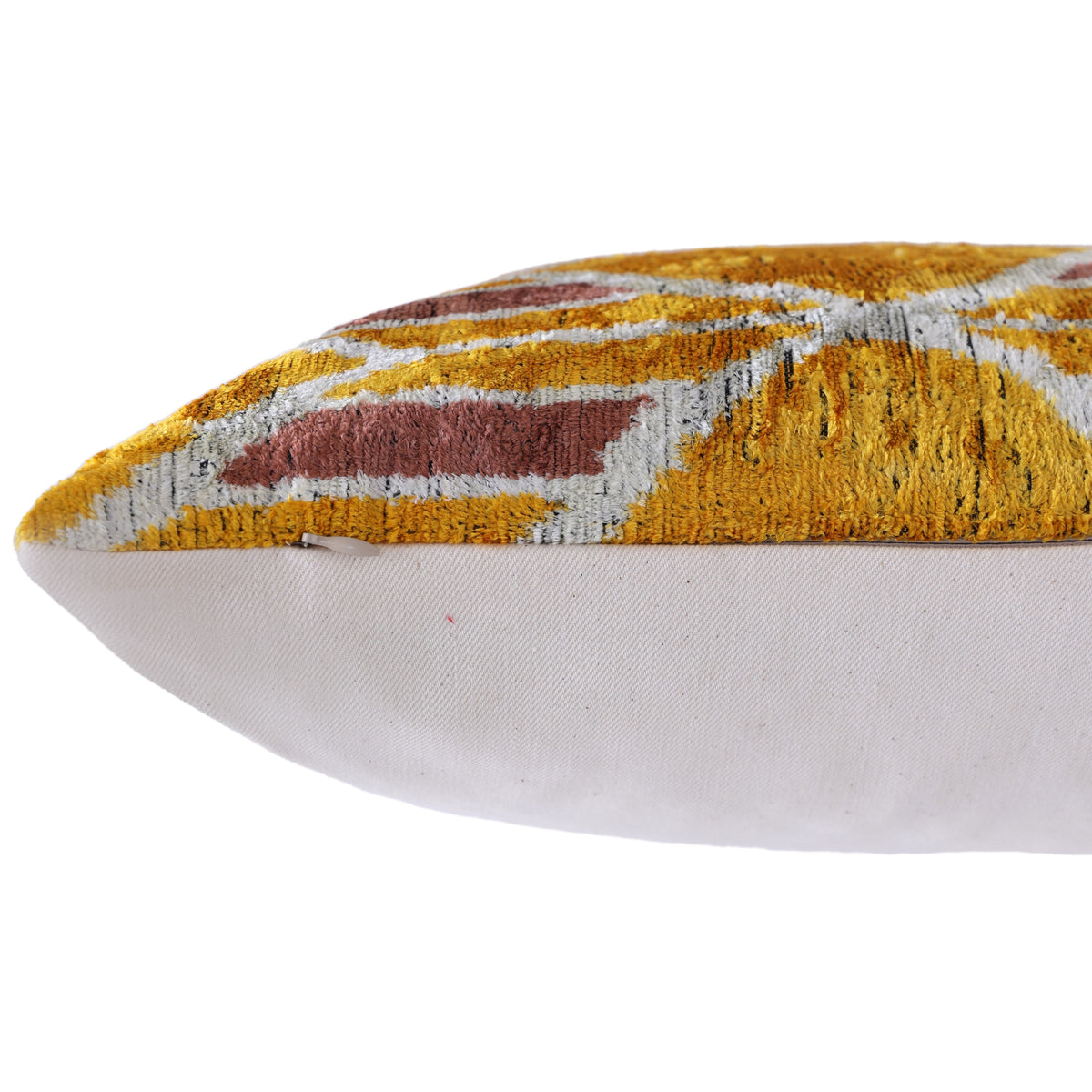 Edge seam and hidden zipper on mustard gold geometric velvet pillow