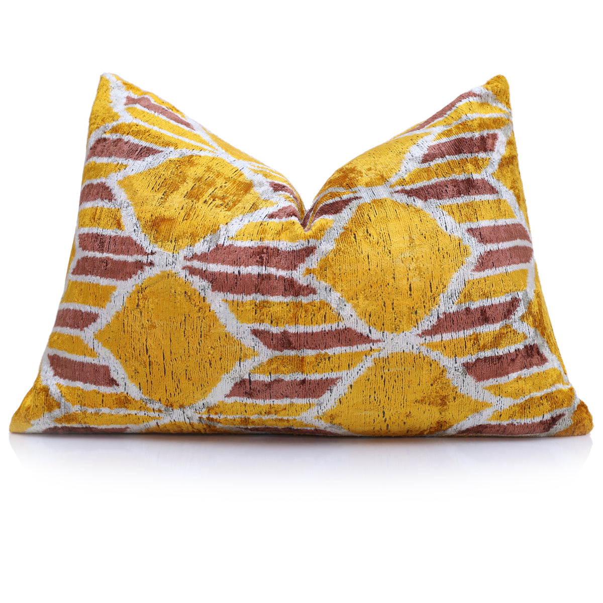 Mustard gold geometric lumbar pillow with a styled center crease