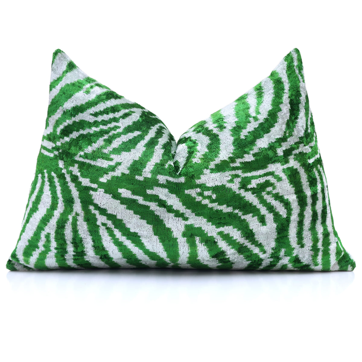 Front view of emerald green and cool white zebra lumbar pillow with a center chop.