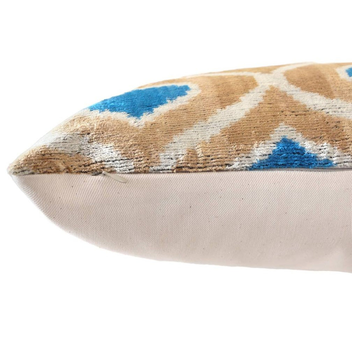 Hidden zipper along the lower edge of the pillow's linen backing