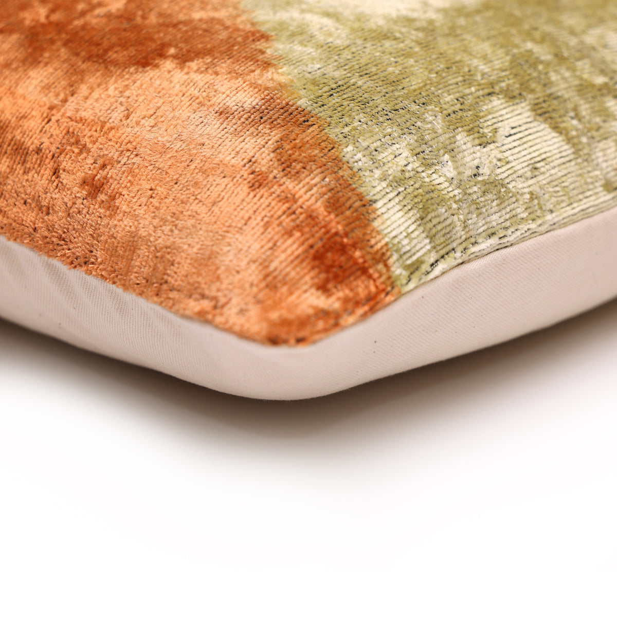 Corner detail showing the seam, rich purple velvet and light backing fabric