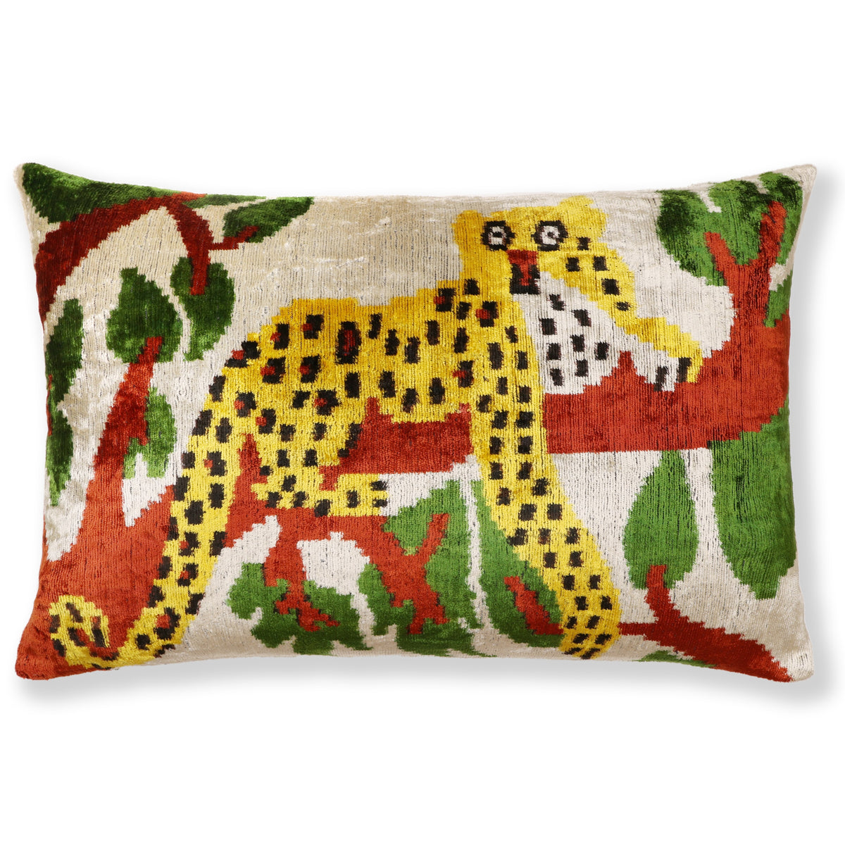 Light oatmeal beige lumbar pillow with rust terracotta tree branch and leopard motif