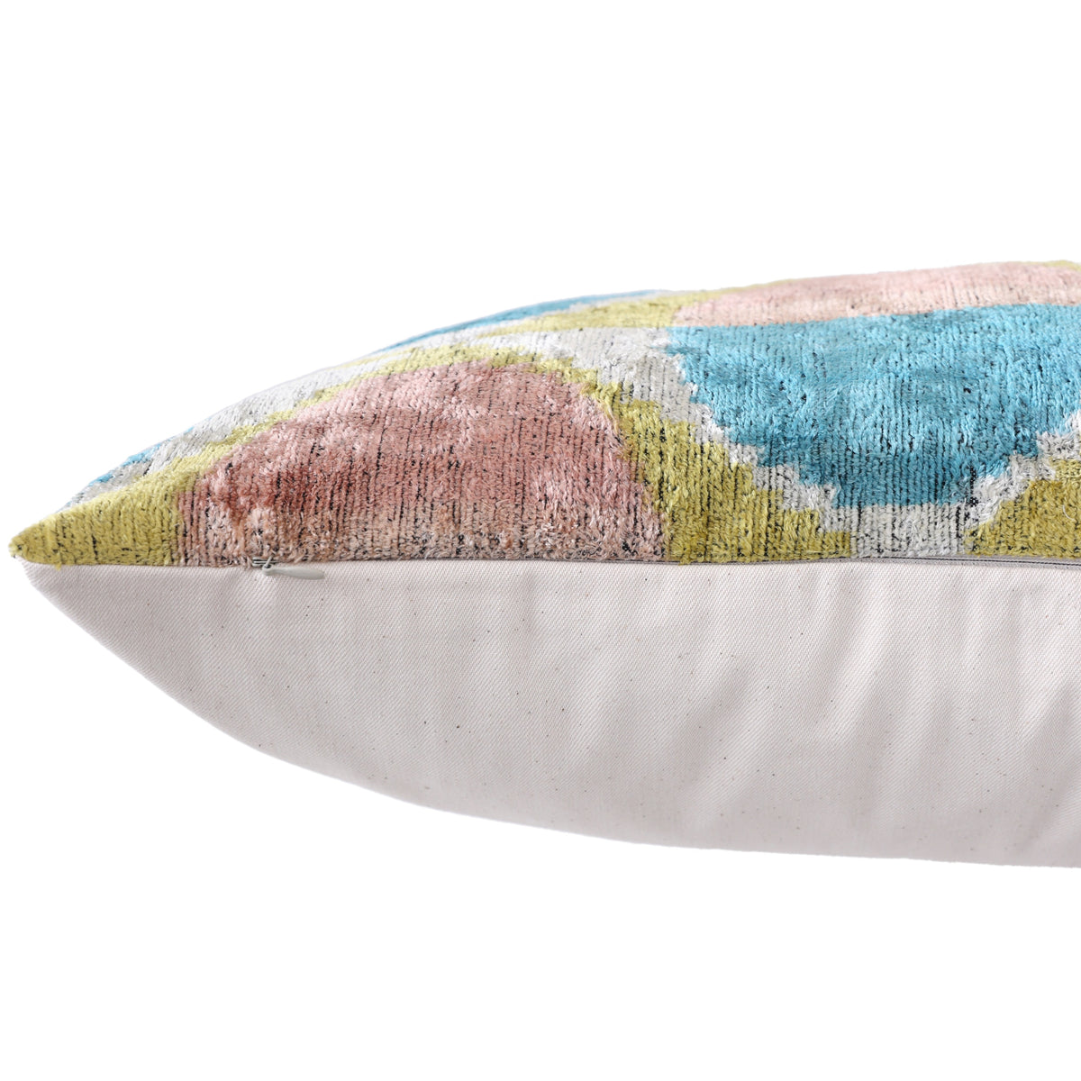 Bottom edge detail showing the hidden zipper closure on the lumbar pillow