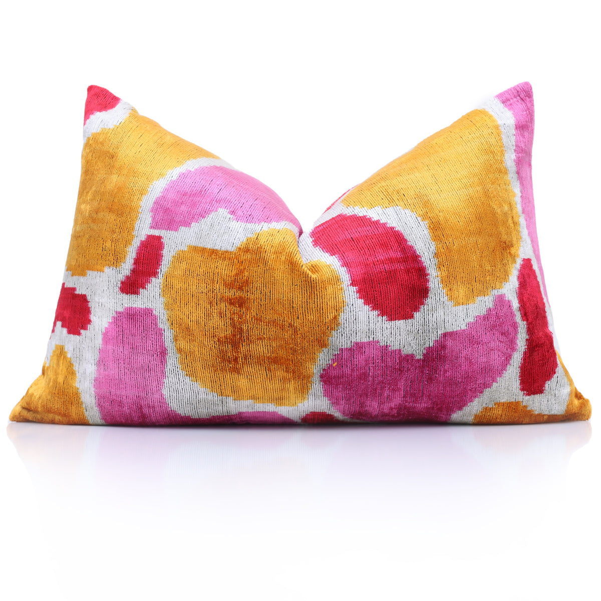 Front view of marigold yellow and fuchsia pink abstract ikat lumbar pillow with chop styling