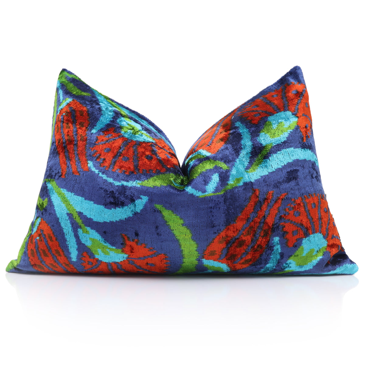 Floral silk velvet lumbar pillow styled upright with a centered karate chop