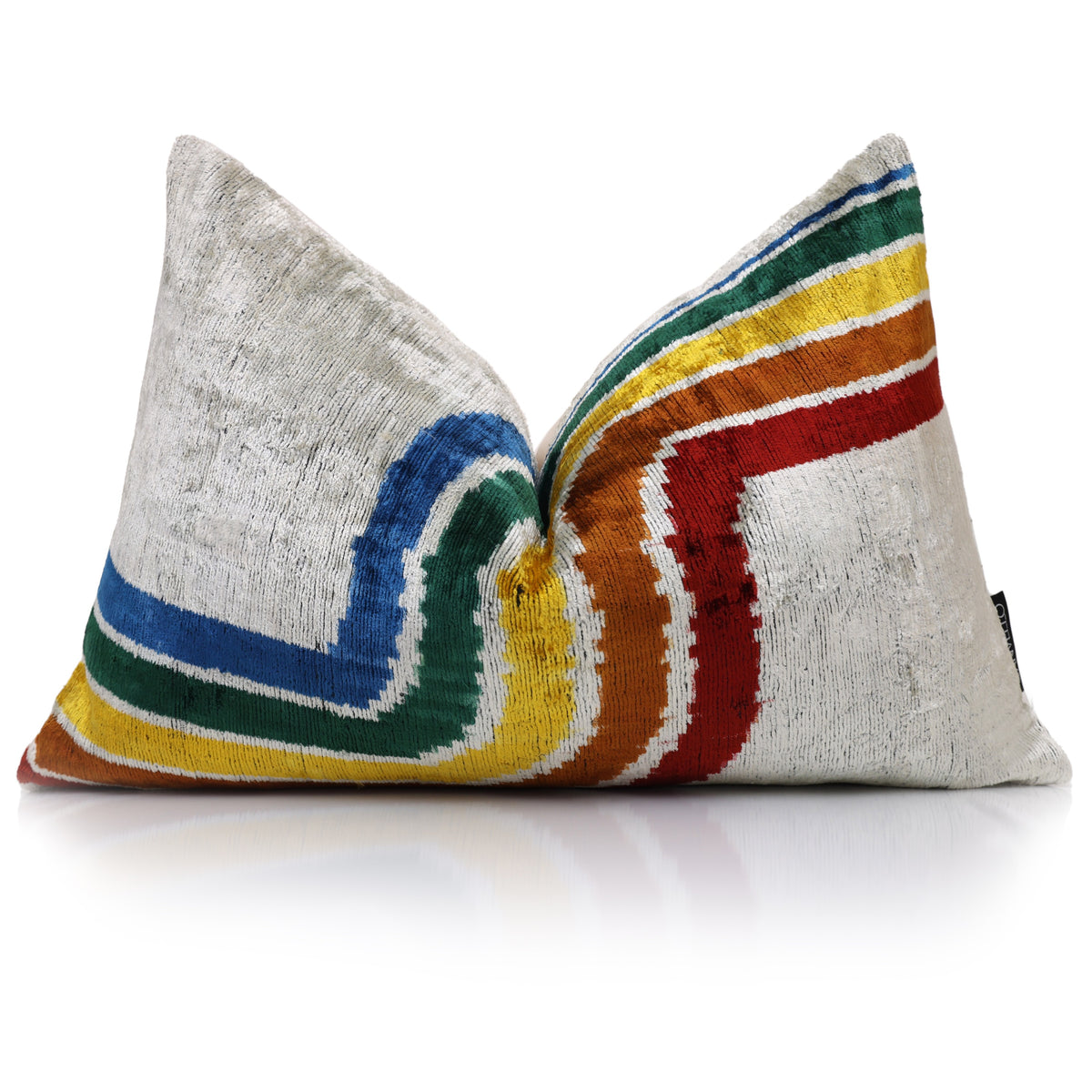 Front view of silvery off-white lumbar pillow with centered multicolor rainbow wave stripe