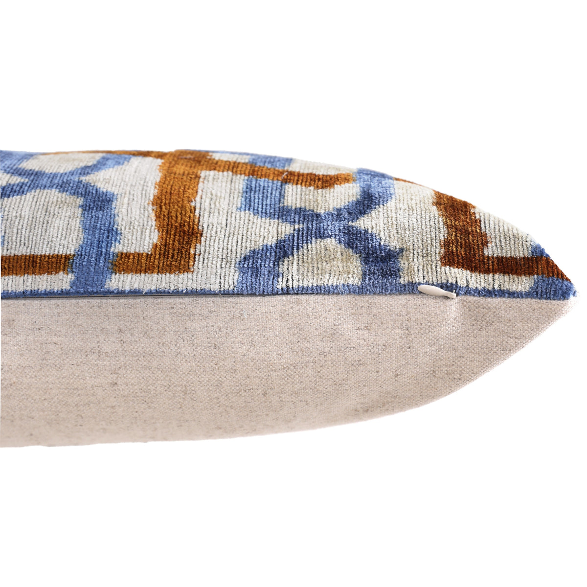 Close-up of the hidden zipper closure on the silk velvet lumbar pillow