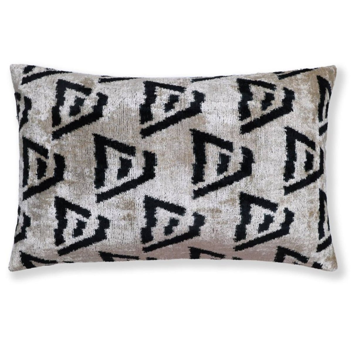 Ivory, sand beige and black geometric triangular lumbar pillow on a white background