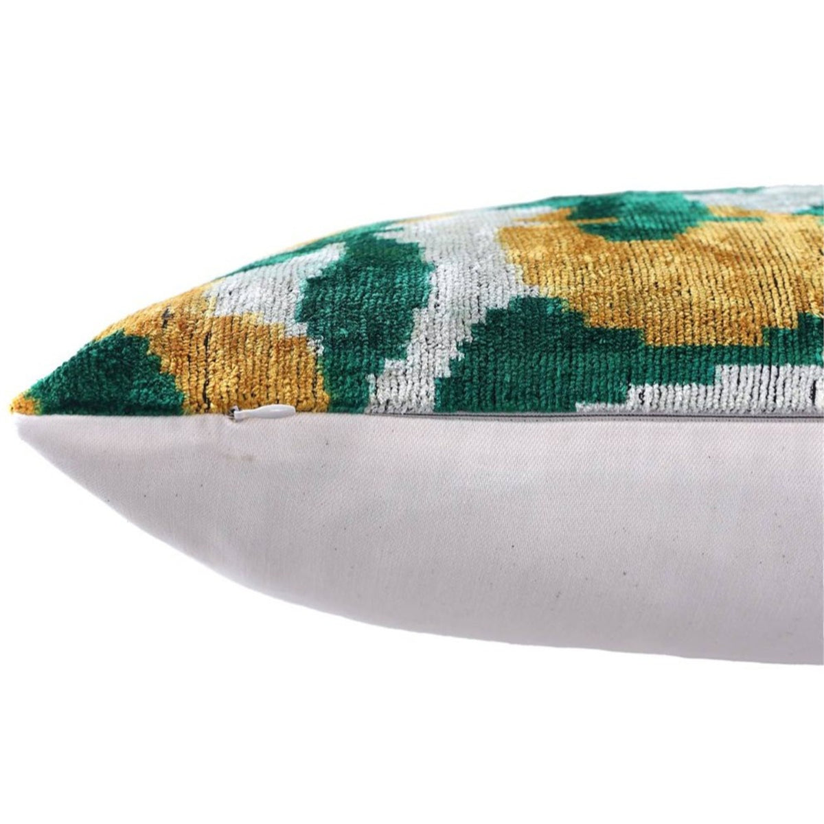 Bottom seam showing concealed zipper on ochre gold and green lumbar pillow