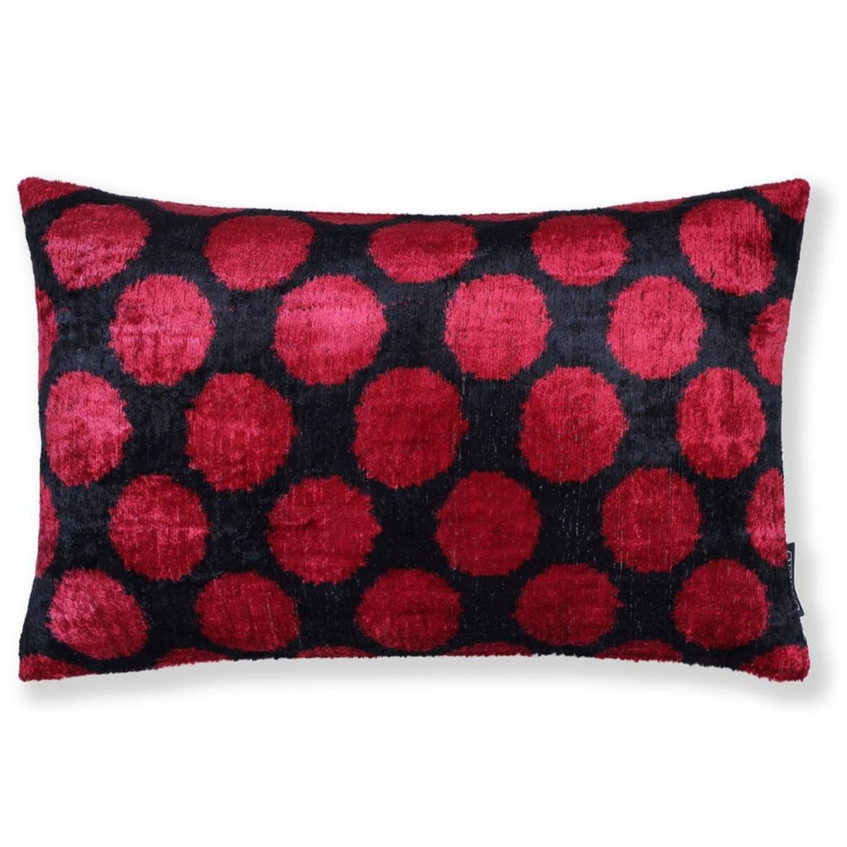 Front view of crimson red and black polka dot silk velvet lumbar pillow