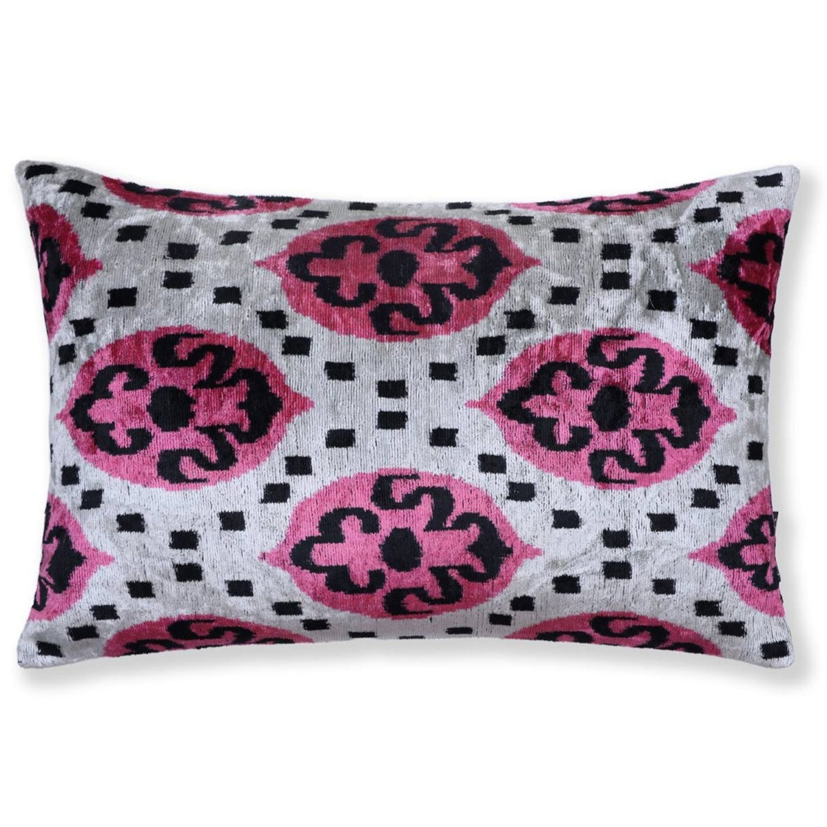 Front view of a lumbar pillow with magenta pink and black medallions on a silvery white ground