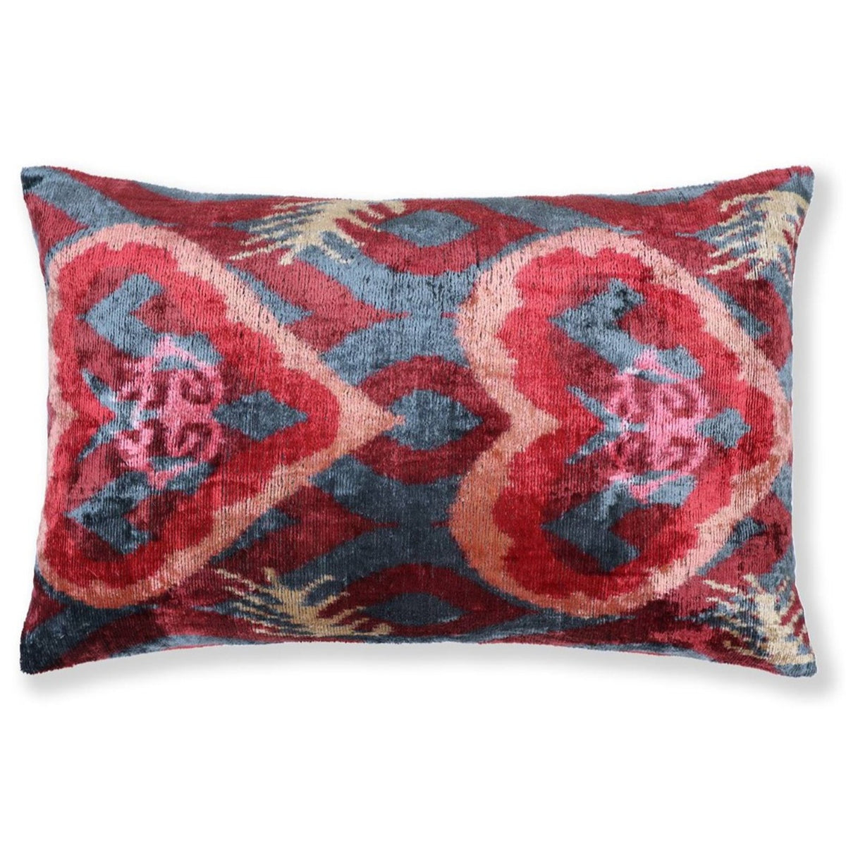 Crimson red and slate blue-gray ikat lumbar pillow with heart motif on a white background