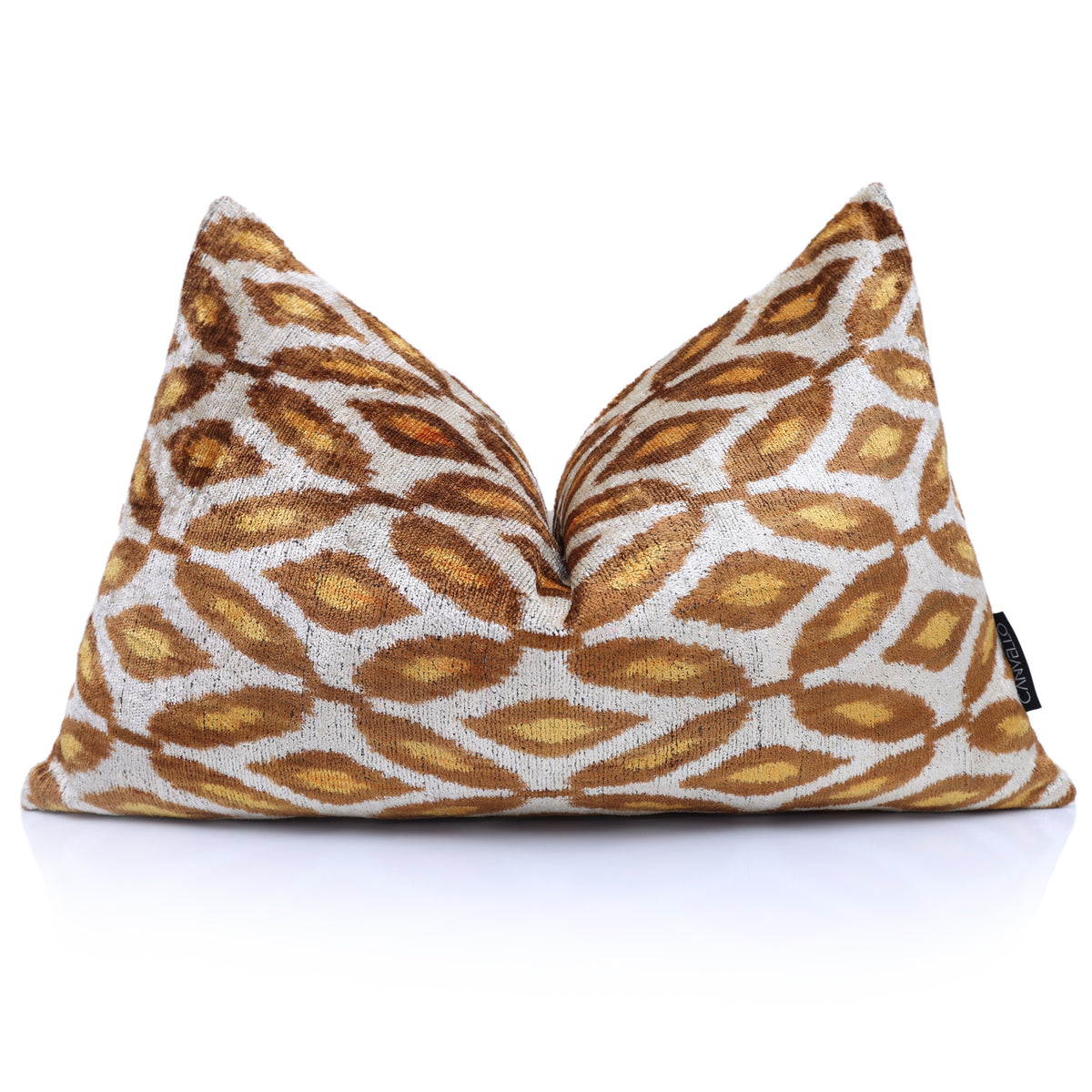 Silvery white, caramel brown and mustard gold lumbar pillow styled with center karate chop