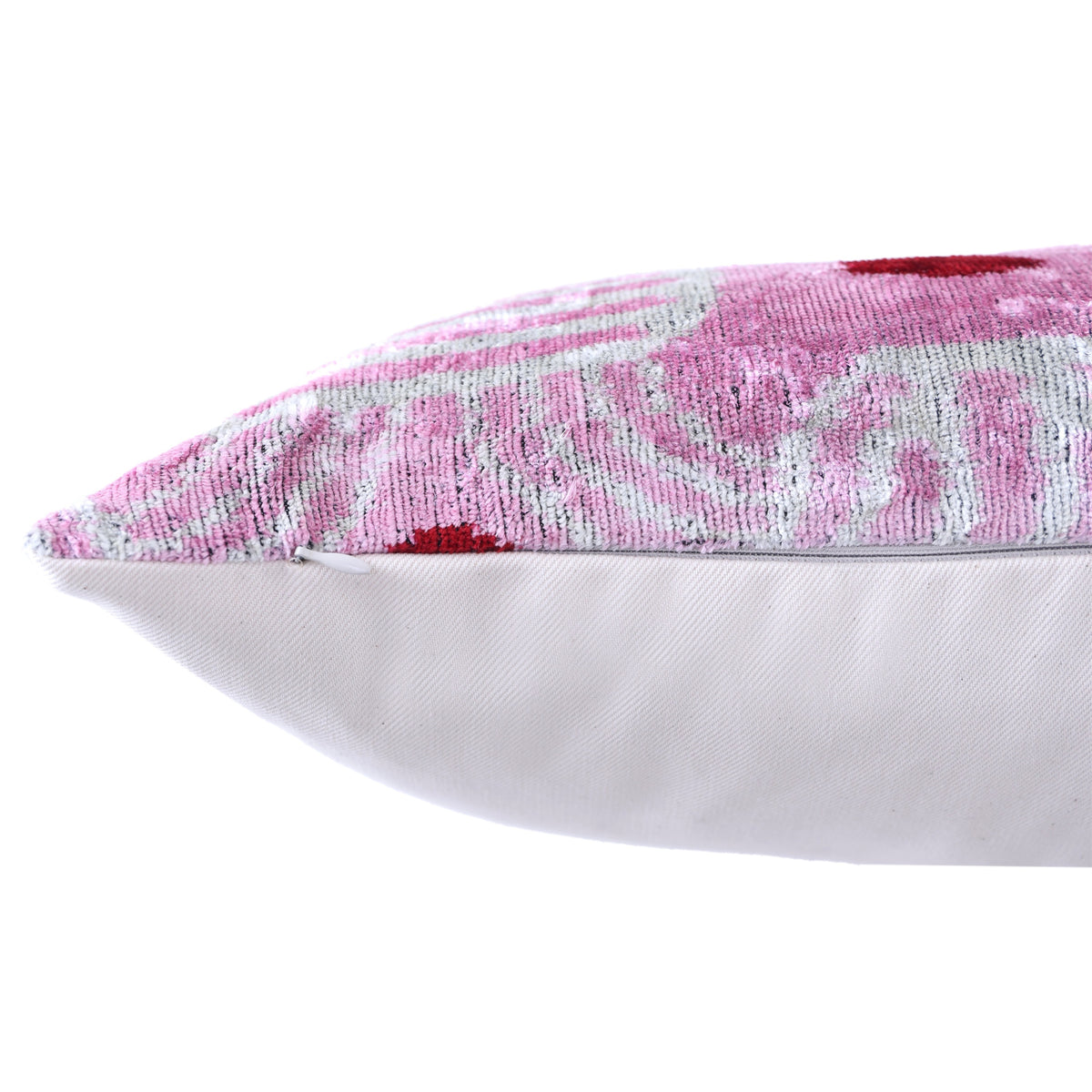 Close-up edge seam with hidden zipper closure on lavender pink silk velvet pillow