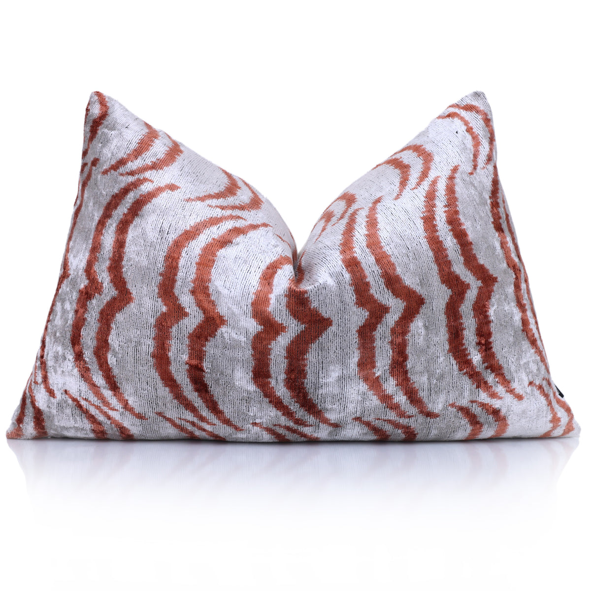 Silver gray and terracotta rust chevron lumbar pillow with a center karate chop