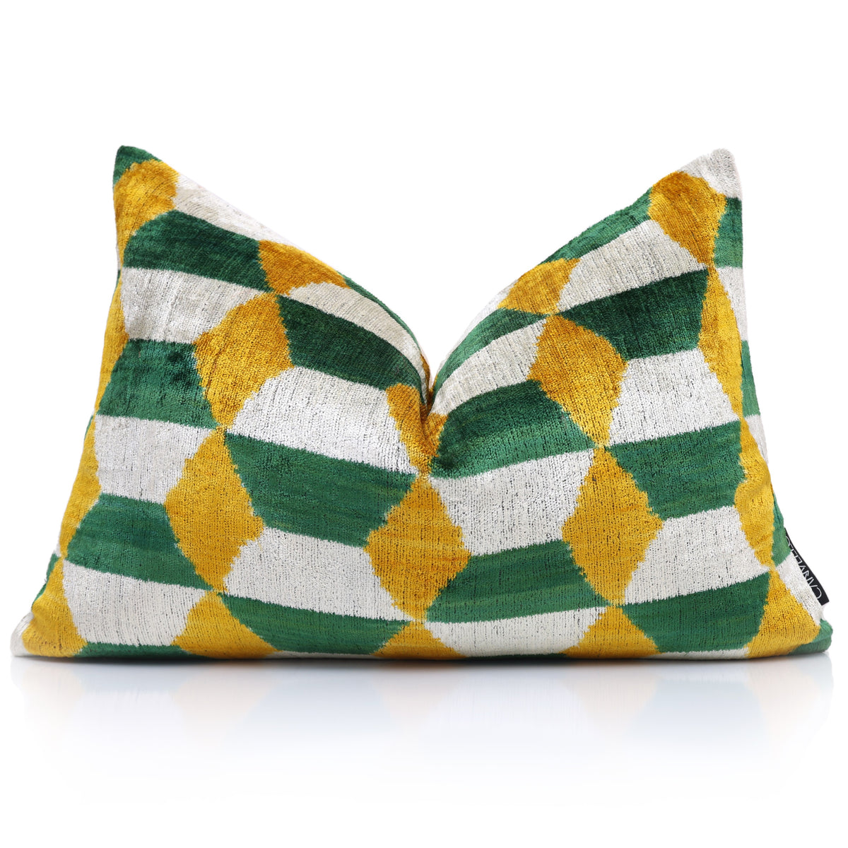 Front view of forest green geometric lumbar pillow with karate chop styling