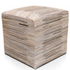 Cube-shaped ottoman with a striped pattern on a white background