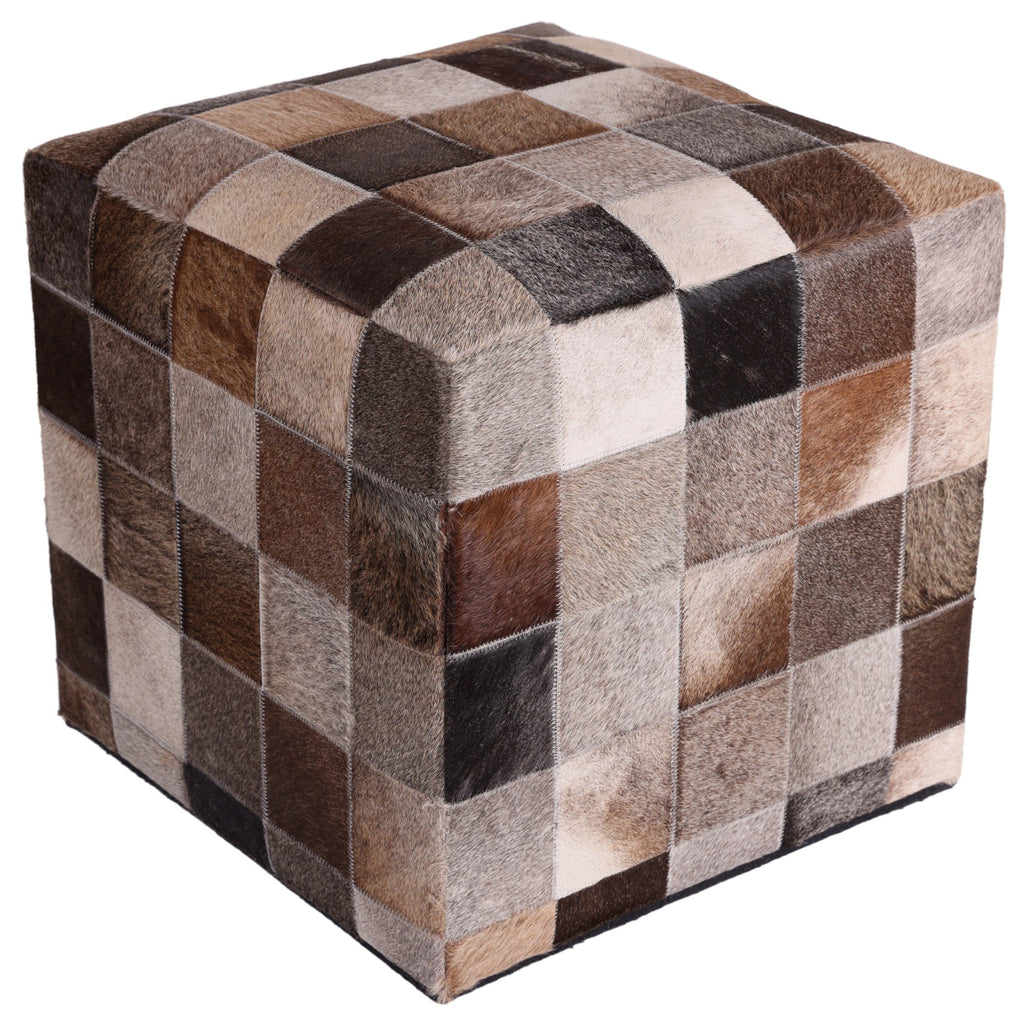 Cube-shaped ottoman with patchwork design on a white background