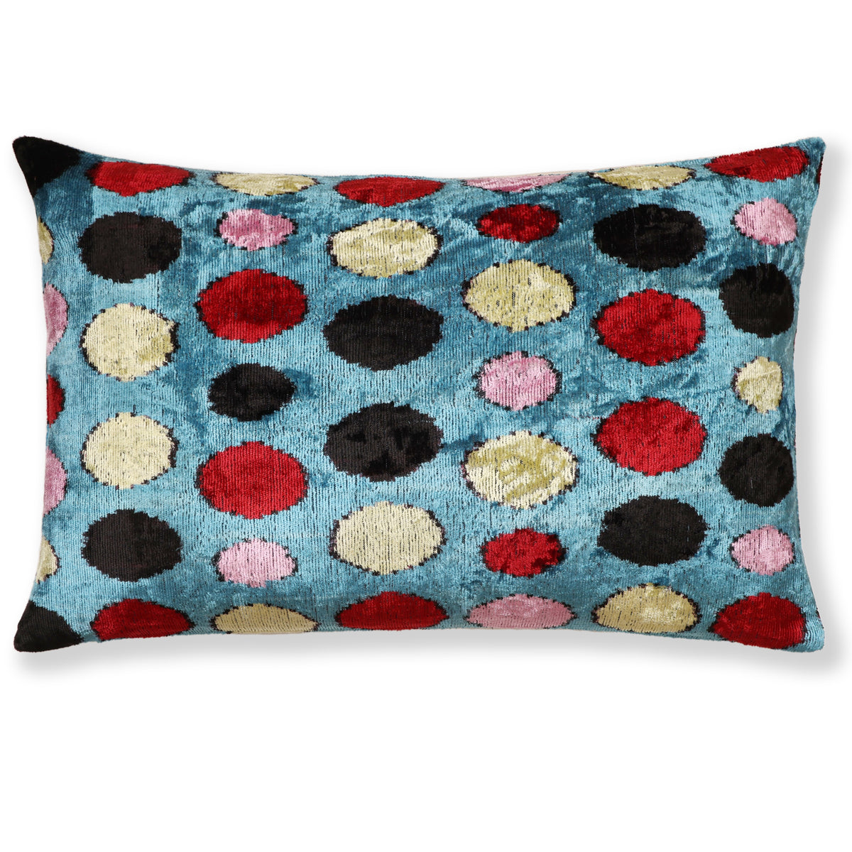 Cerulean blue lumbar pillow with black, crimson red, pale yellow and light pink polka dots
