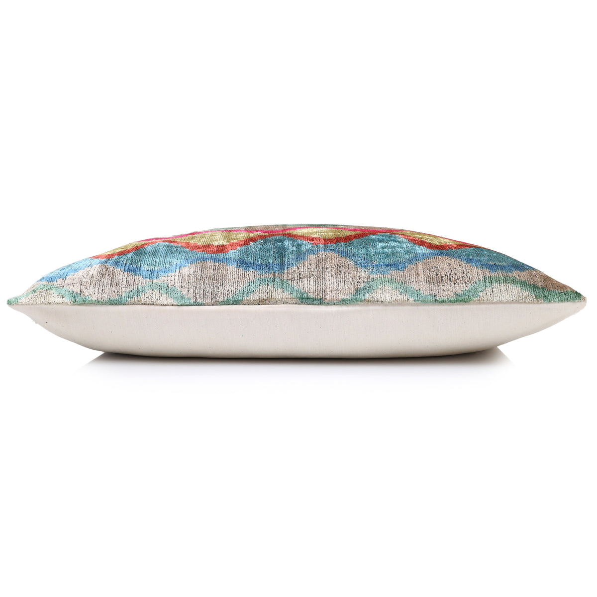 Side profile of a 16 x 24 lumbar pillow with wavy ikat velvet front