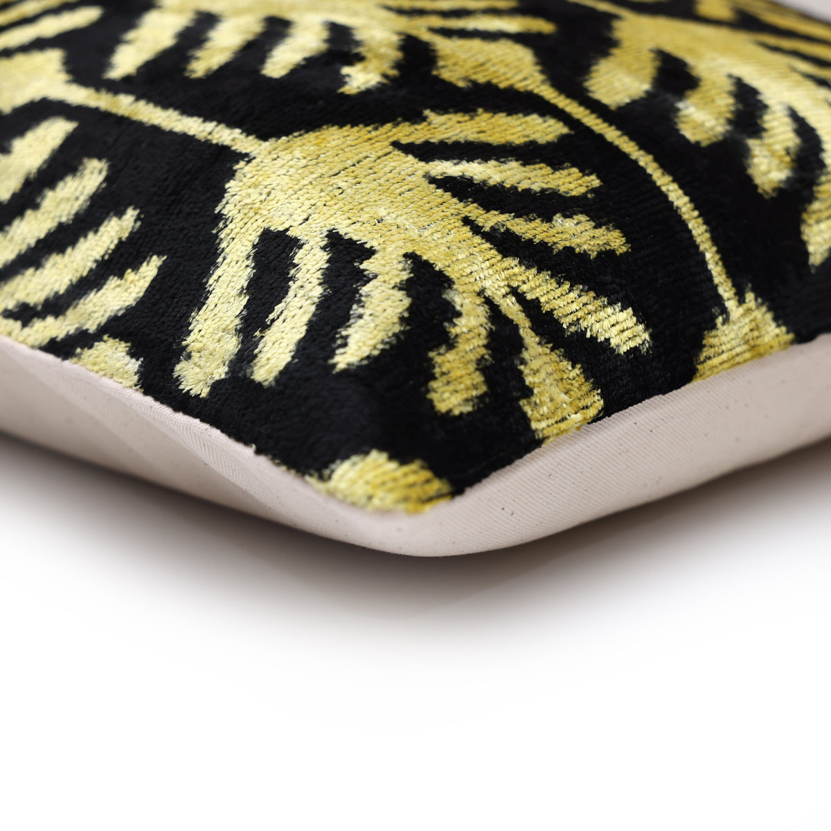 Corner detail showing chartreuse gold velvet front and plain black back