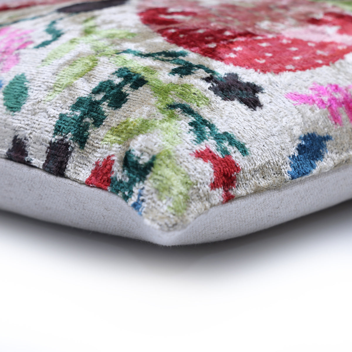 Corner seam detail showing the velvet front transitioning to the light backing
