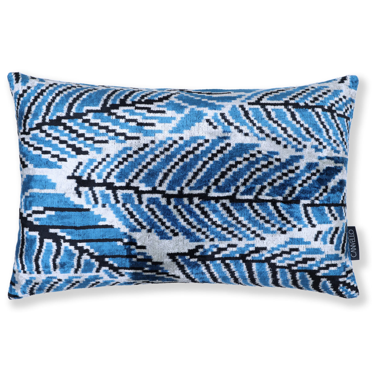 Cerulean blue and bright white feather ikat pattern on a silk velvet lumbar pillow