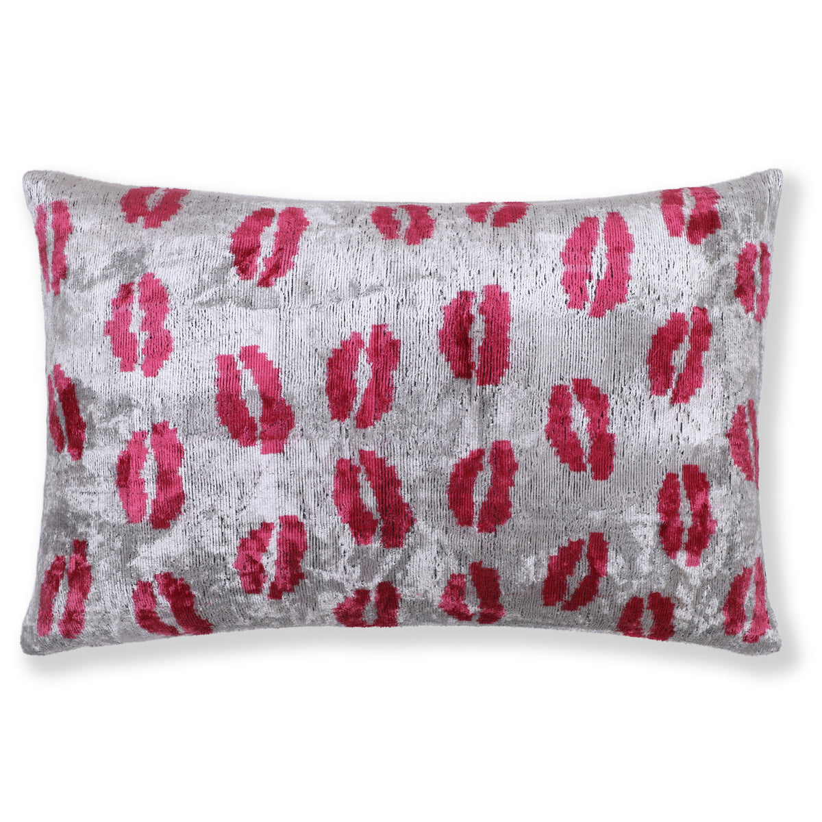 Silver gray lumbar pillow with scattered fuchsia pink lips motif on white background
