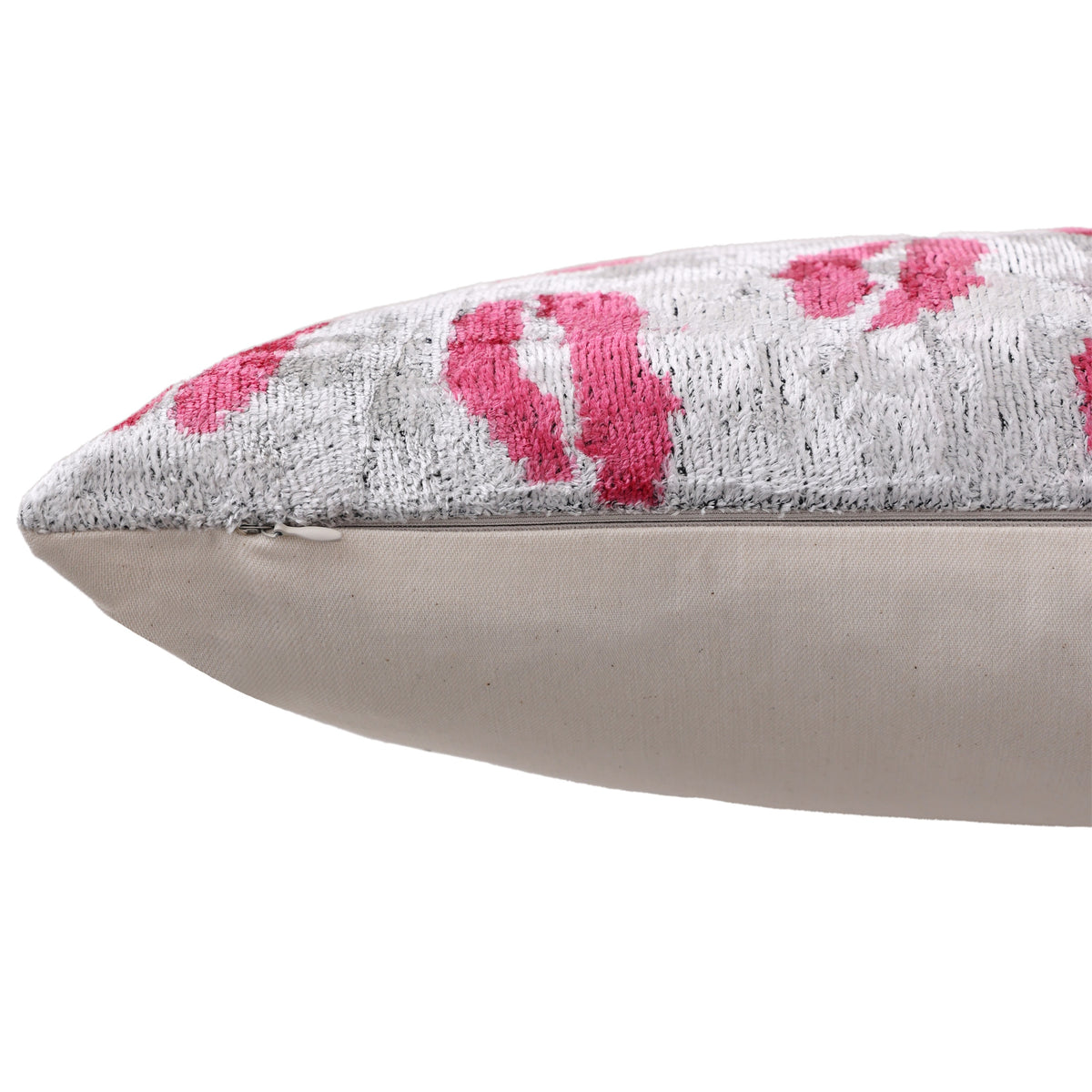 Close-up of hidden zipper along the silver gray velvet edge seam