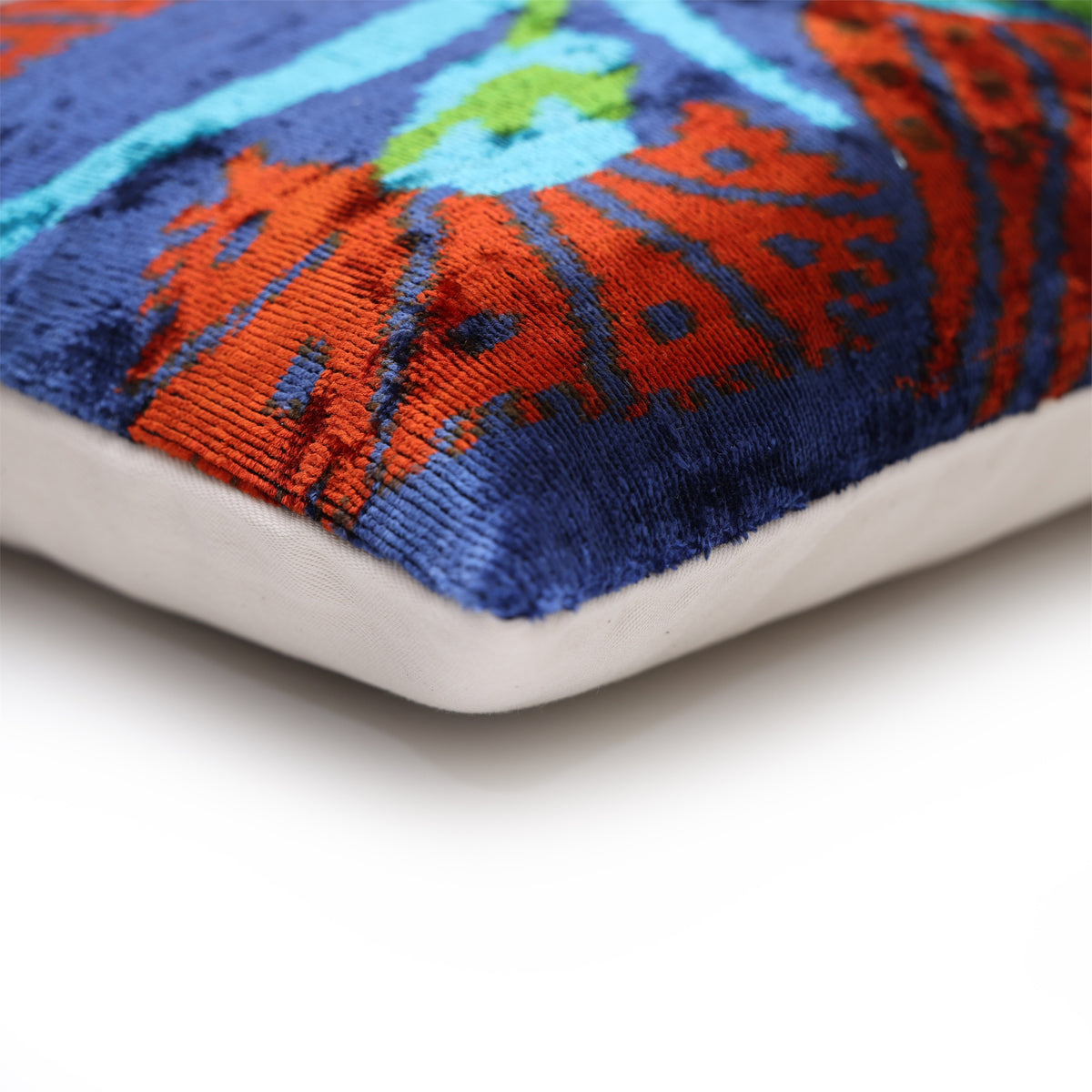 Close-up of corner seam with patterned silk velvet front and plain linen backing