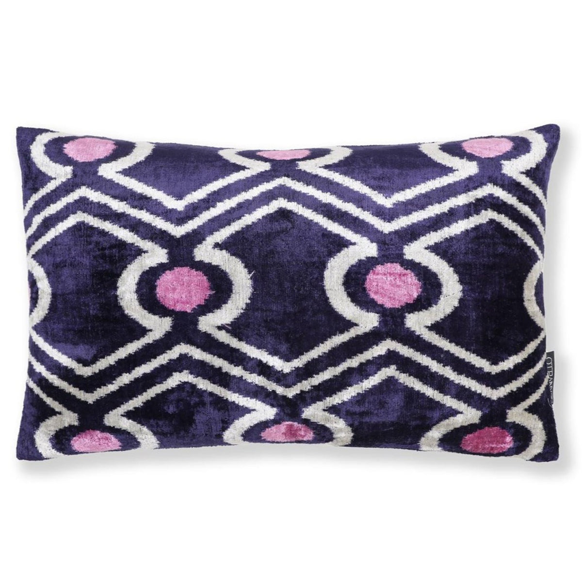 Deep indigo purple, white and mauve pink geometric diamond trellis ikat lumbar pillow on white background