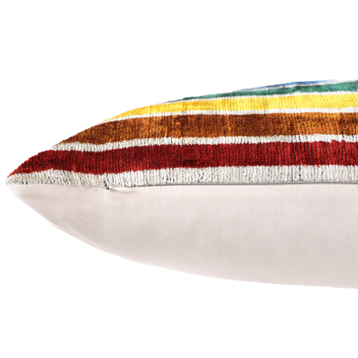 Close-up of edge seam and hidden zipper on a multicolor wave stripe pillow