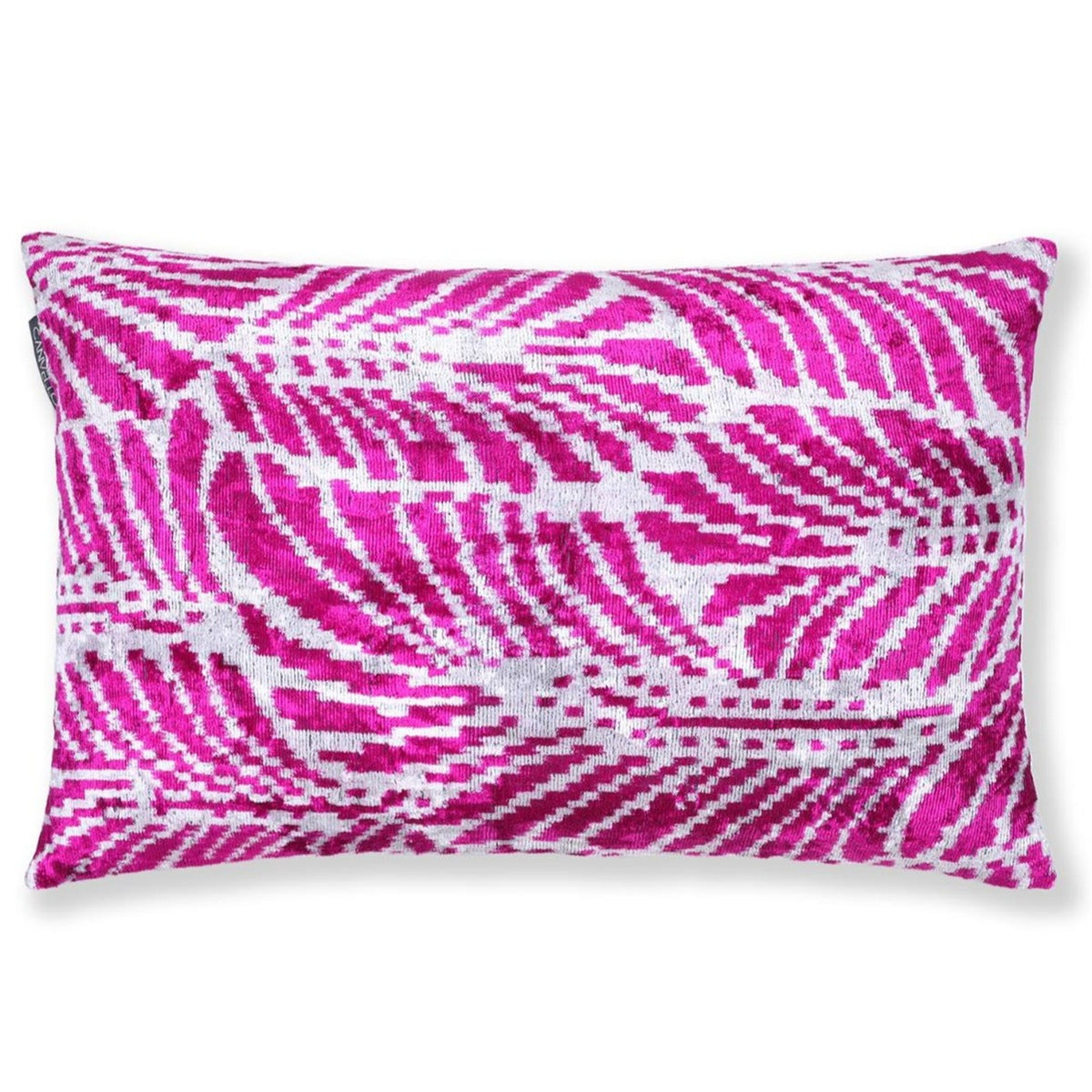Magenta pink and crisp white ikat lumbar pillow shown from the front on a white background