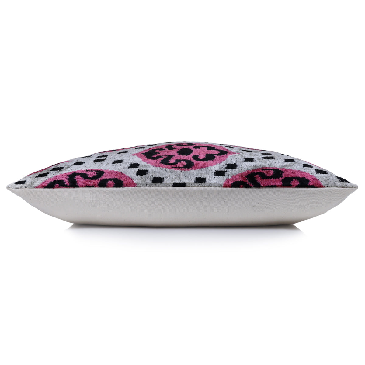 Side profile showing the lumbar pillow thickness and backing