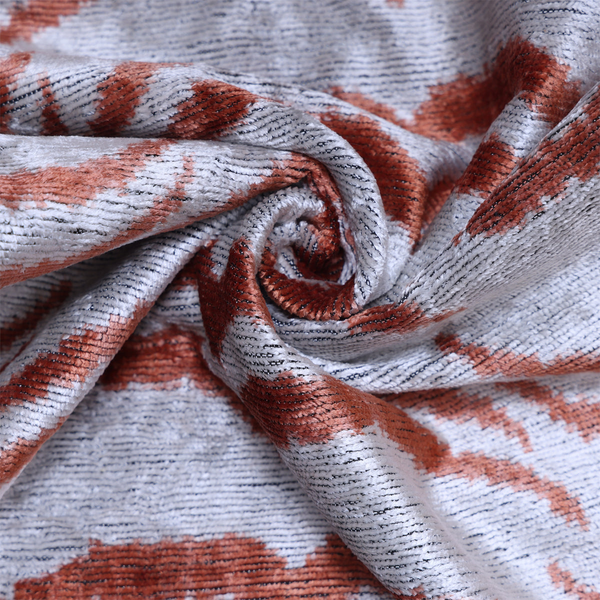 Close-up of silver gray gathered silk velvet with ribbed texture