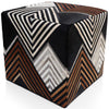 Cube-shaped ottoman with a geometric pattern on a white background